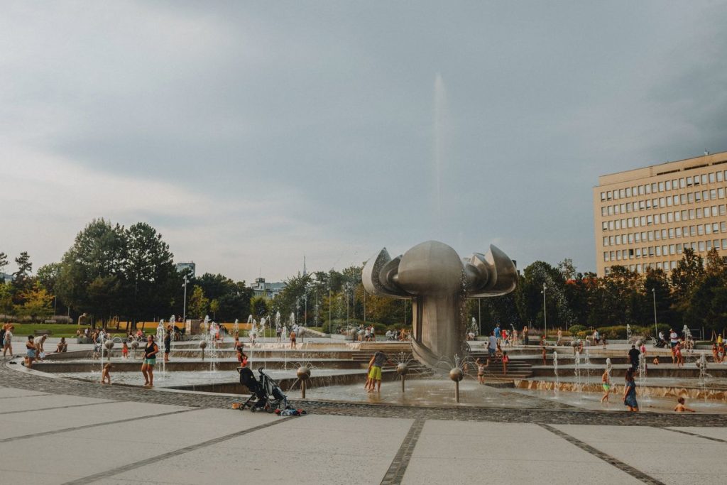 Climate Change and the Rising Toll of Heat Deaths in European Cities People in a European city during a summer heatwave
